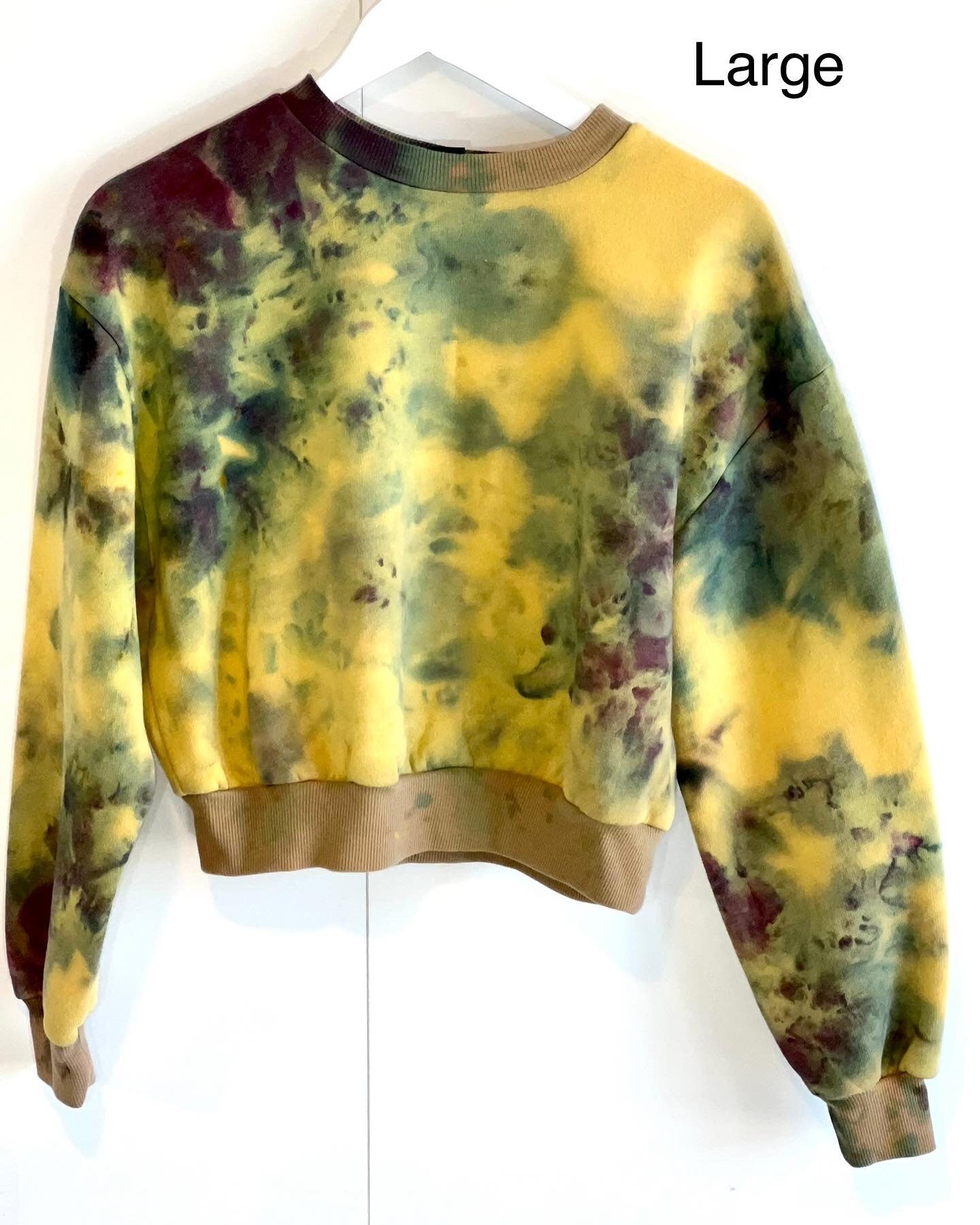 Gold purple and blue-green cropped sweatshirt. Maradi gras