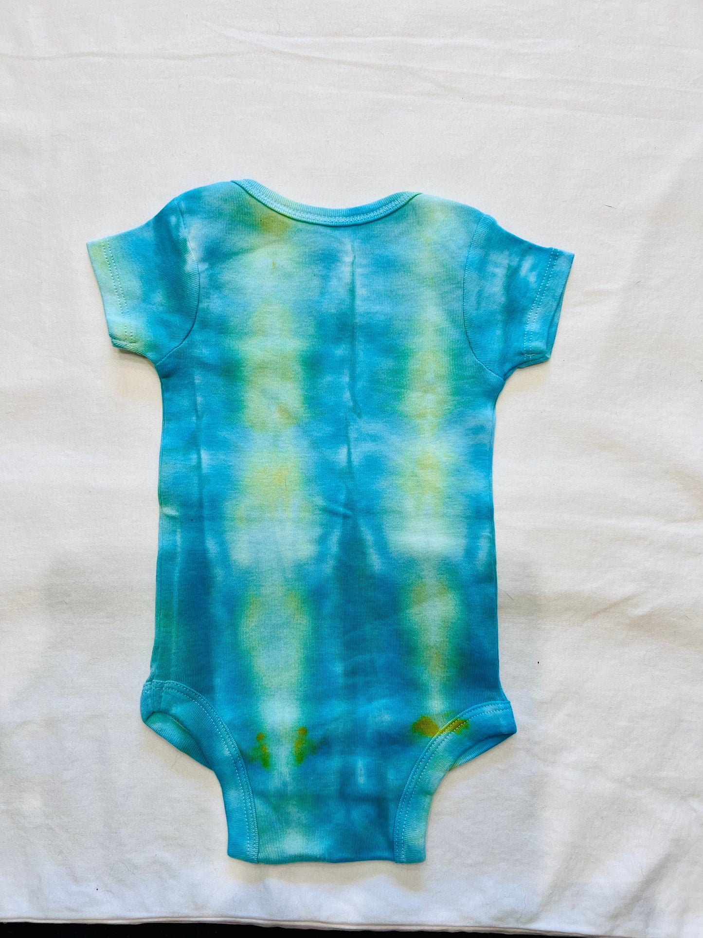 blue and gold ice dyed organic Baby onesie 0-3 months