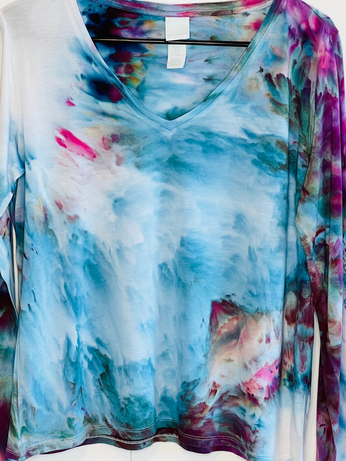 Abstract Fuscia and blue ice dyed long sleeve v- neck shirt. Medium