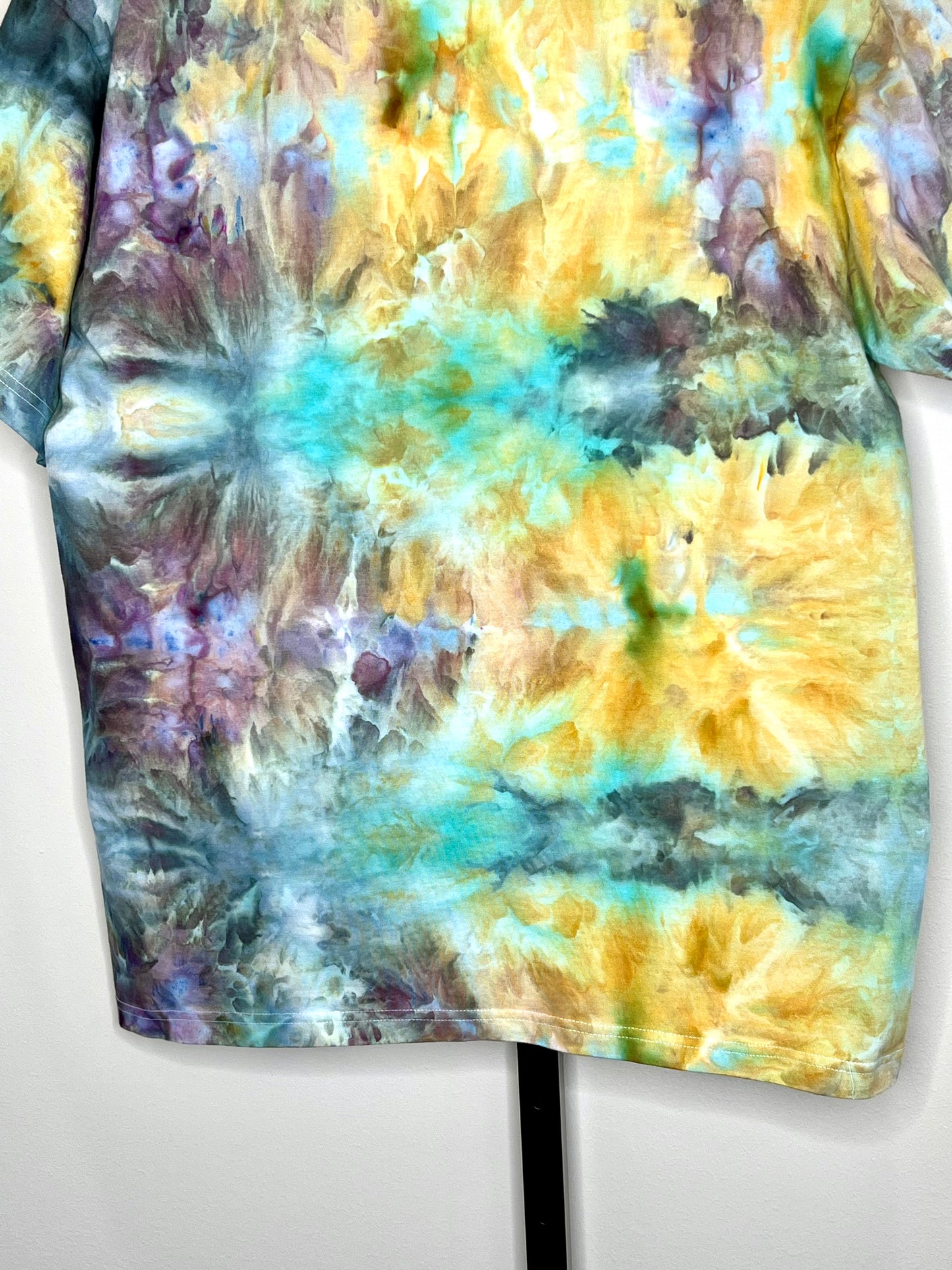 Reimagined peacock ice dyed short sleeve unisex shirt. Large