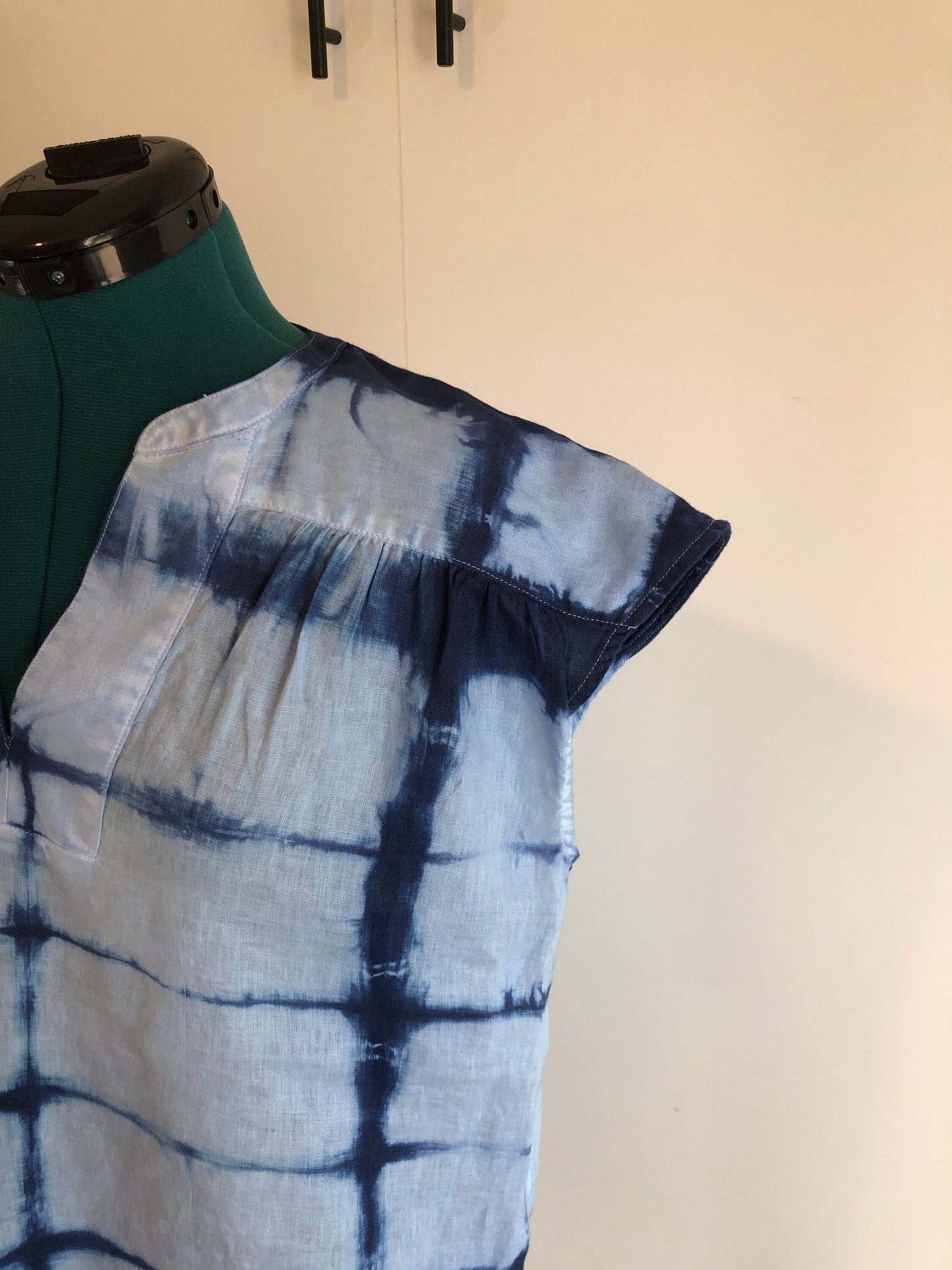 Indigo shibori linen short sleeve blouse.