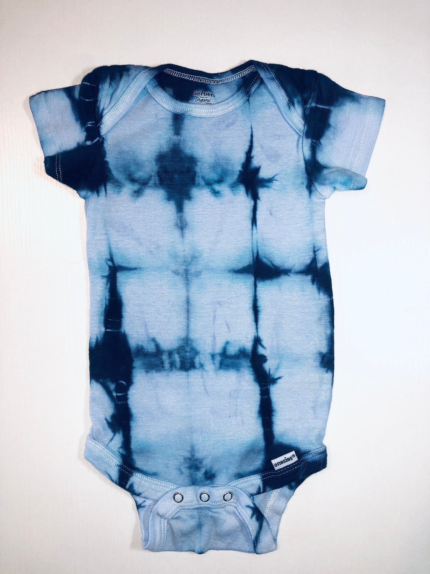 Organic indigo shibori tie dye onesies/ t- shirts- all sizes