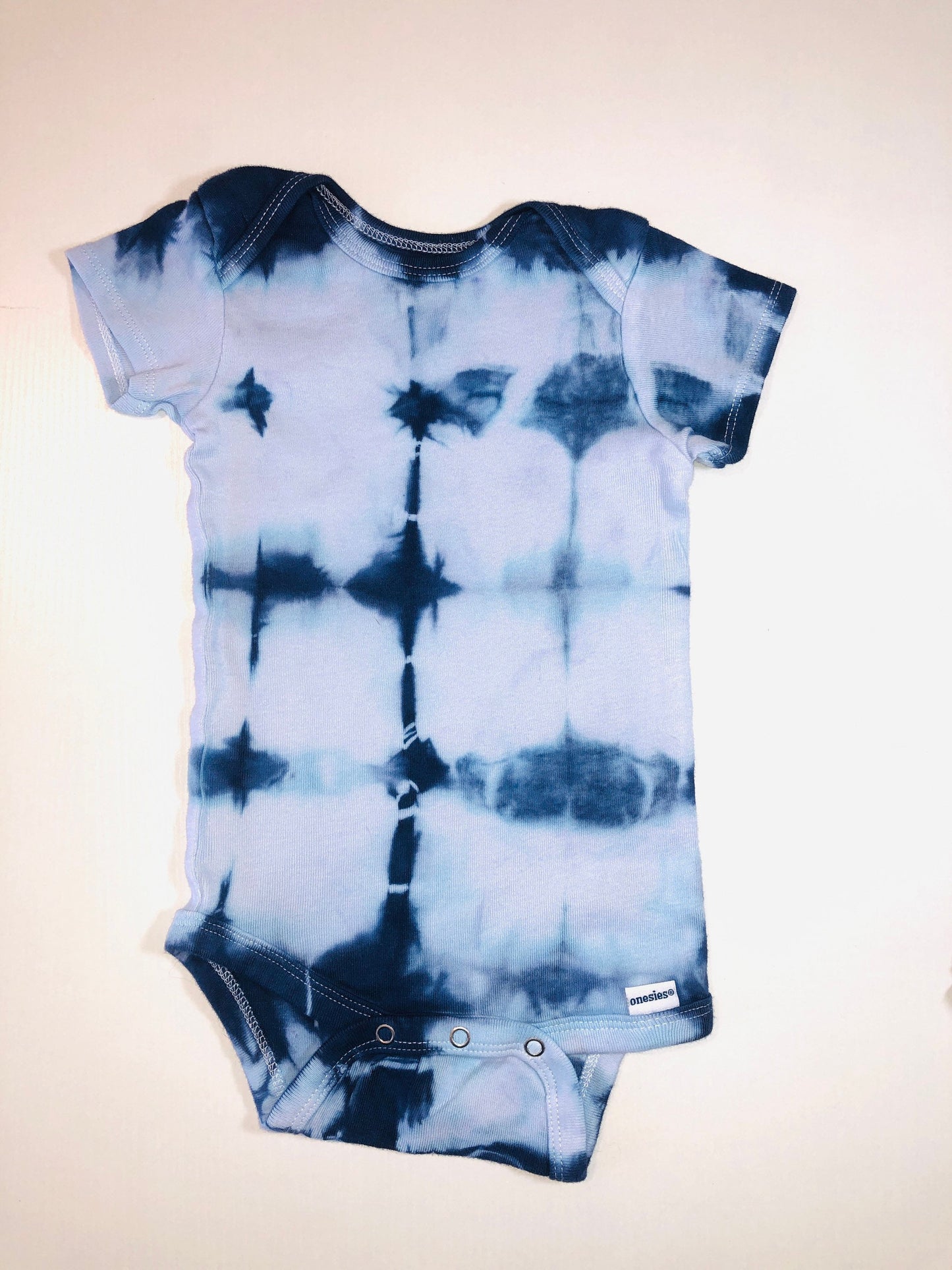 Organic indigo shibori tie dye onesies/ t- shirts- all sizes