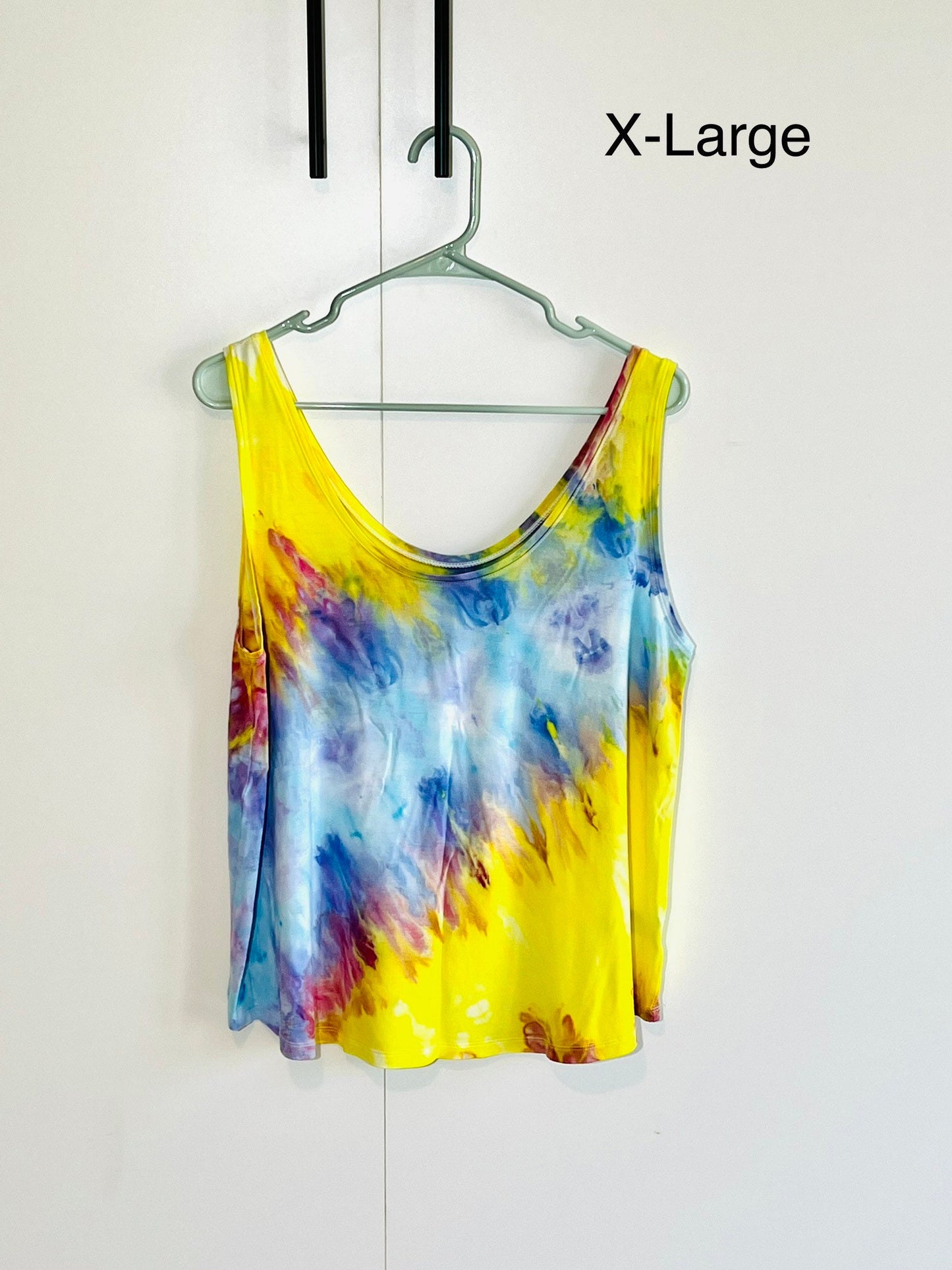 Bright rainbow tie dye tank top.